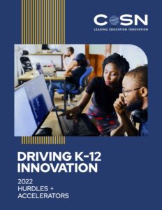 Driving K-12 Innovation: Hurdles + Accelerators 2022 report cover featuring diverse students working together on the computer in a classroom.