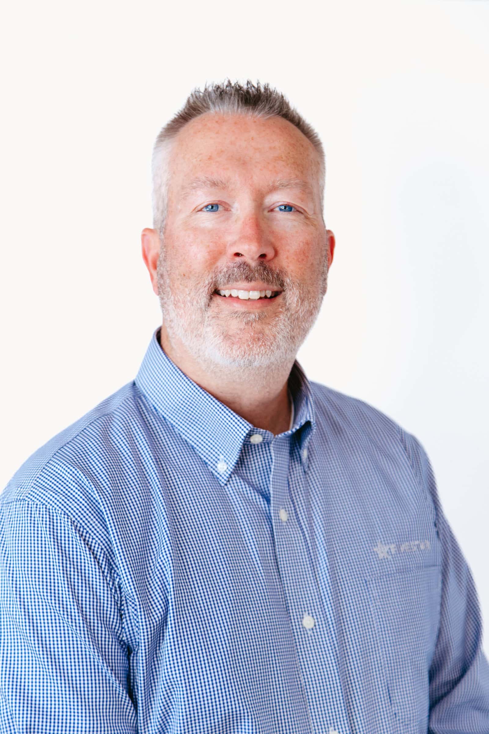 Nathan Davison, CETL® A headshot photo of a man smiling at you.