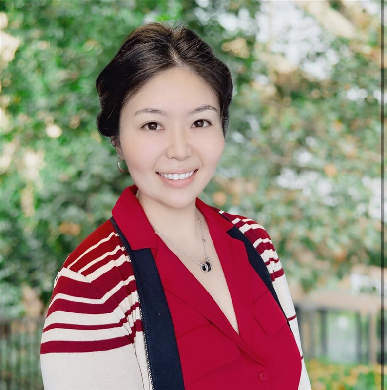 A portrait of a woman smiling